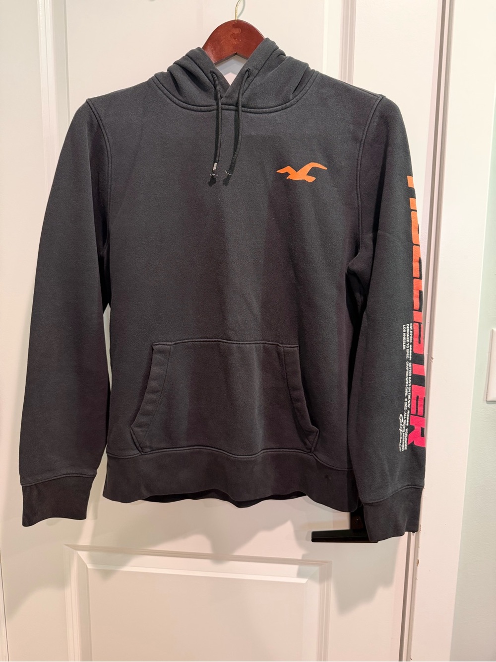 Hollister Men’s Black Hoodie with Orange Logo